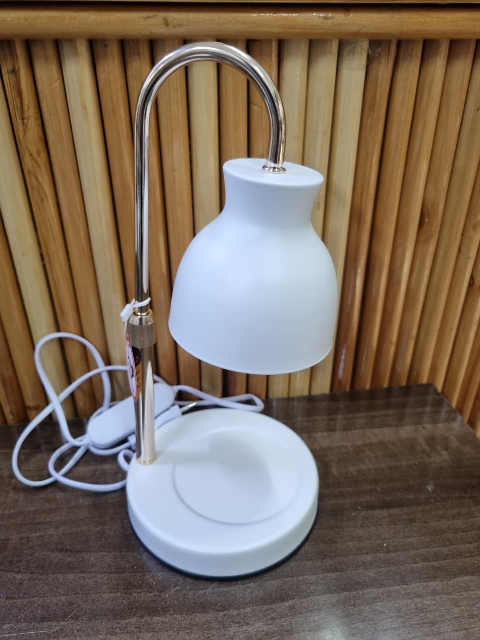 Bell-Shaped Curve Neck Electric Candle Warmer Lamp Featuring a sleek, arched silhouette