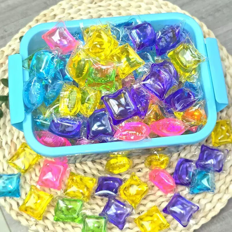 TikTok popular item - 90-100-pack box of laundry powder beads with long-lasting fragrance, softening and stain-removing function, three-in-one beads