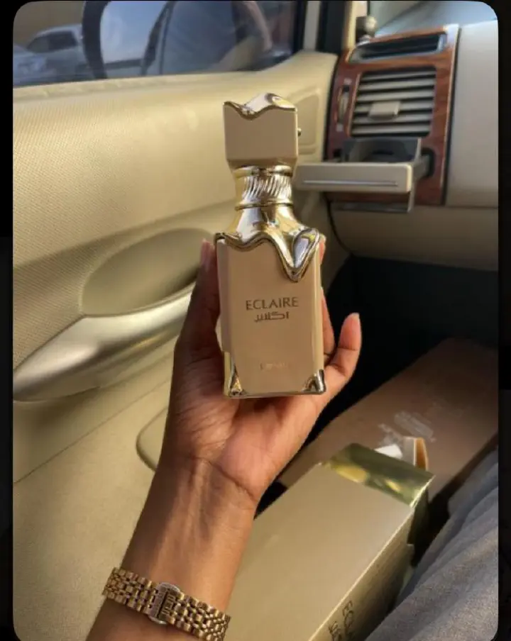Lattafa Eclaire is a 100ml gourmand Eau de Parfum with a sweet, dessert-like profile. Notes of caramel, vanilla, and sugar create a warm, indulgent scent reminiscent of pastry. The bottle and box fe