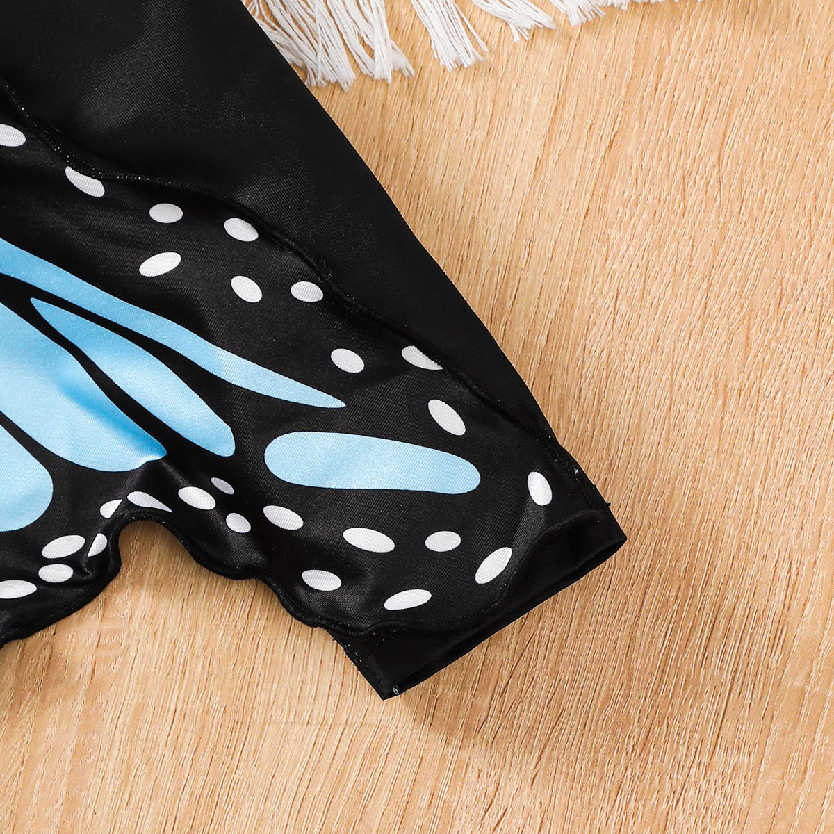 【4-7Y】 Toddler Girl Black Long Sleeve Top with Blue Butterfly Wing Print Back | Unique Fashion Wear