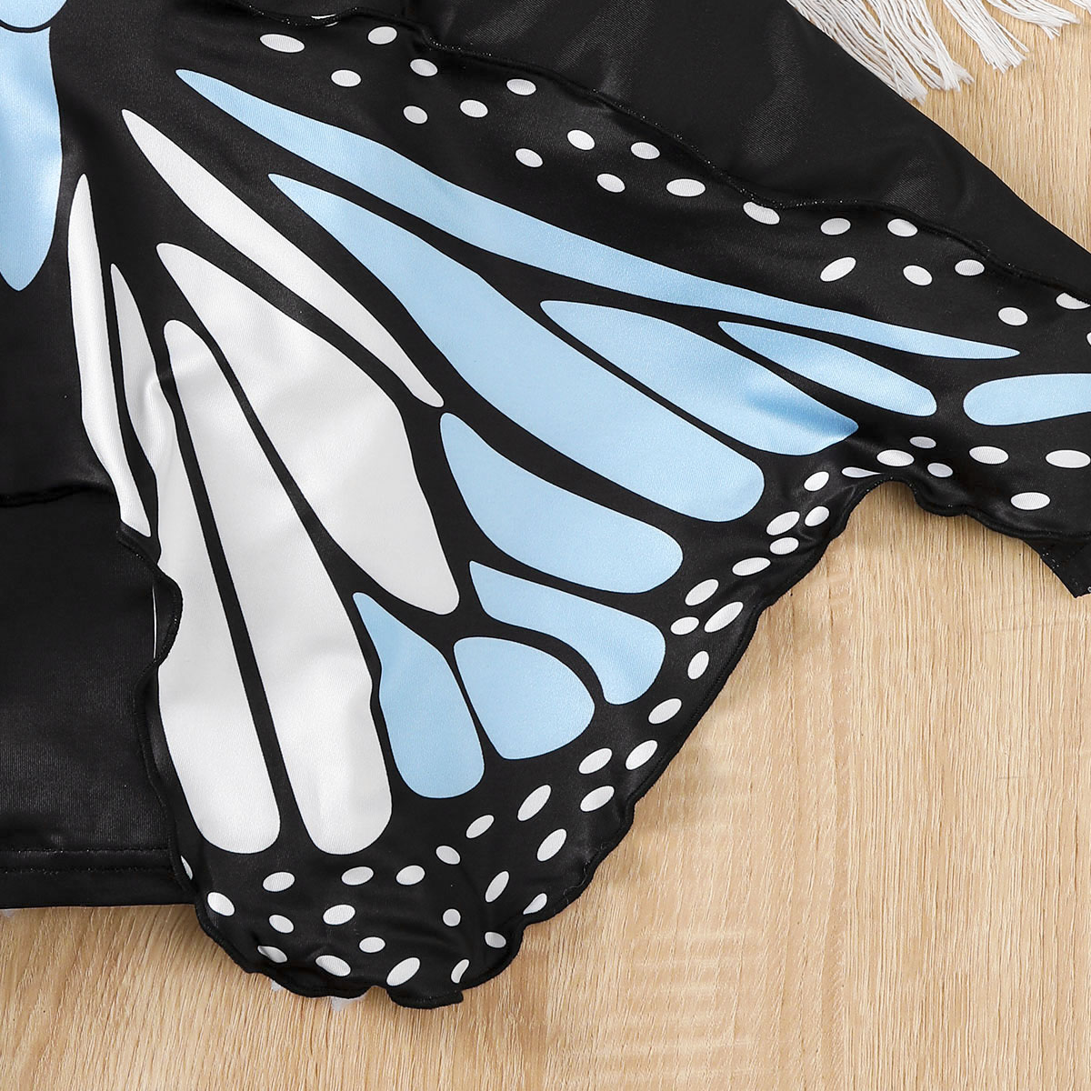 【4-7Y】 Toddler Girl Black Long Sleeve Top with Blue Butterfly Wing Print Back | Unique Fashion Wear