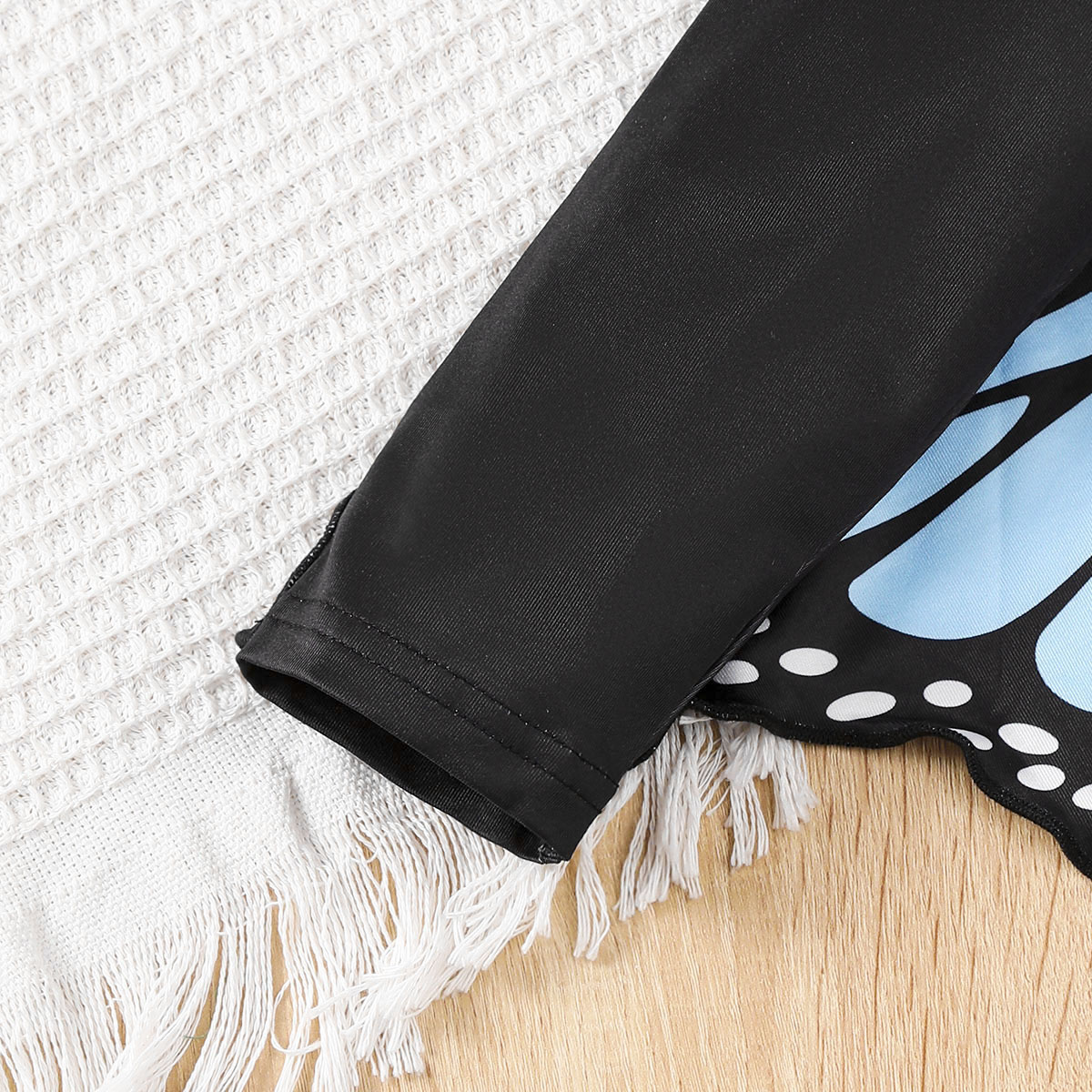 【4-7Y】 Toddler Girl Black Long Sleeve Top with Blue Butterfly Wing Print Back | Unique Fashion Wear