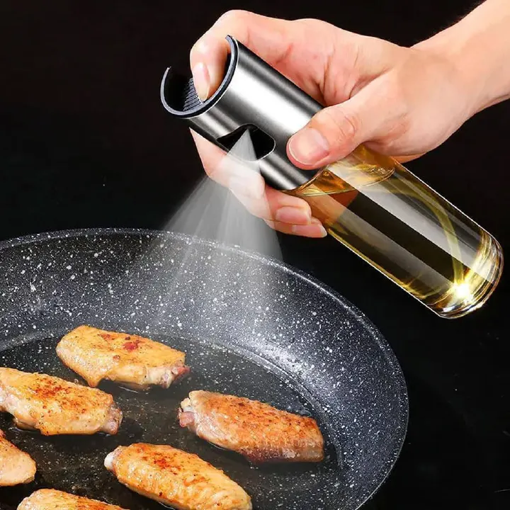 Kitchen press - action oil spray bottles. oil dispenser, they help control oil usage. Ideal for cooking and grilling, these bottles spray oil evenly.They can also hold condiments like oil and vinegar。