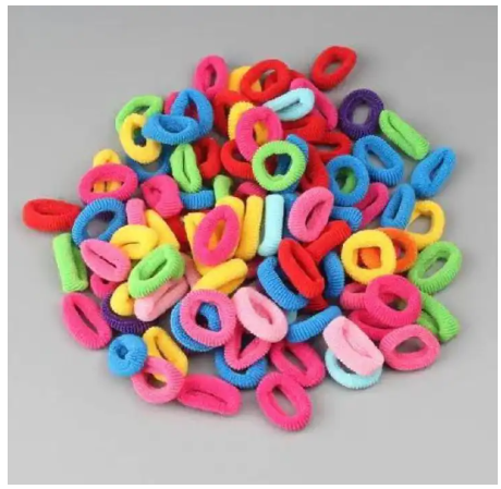 Fashion Mini Coloured Elastic Kids Hair Rubber Bands Selling at 650 per dozen