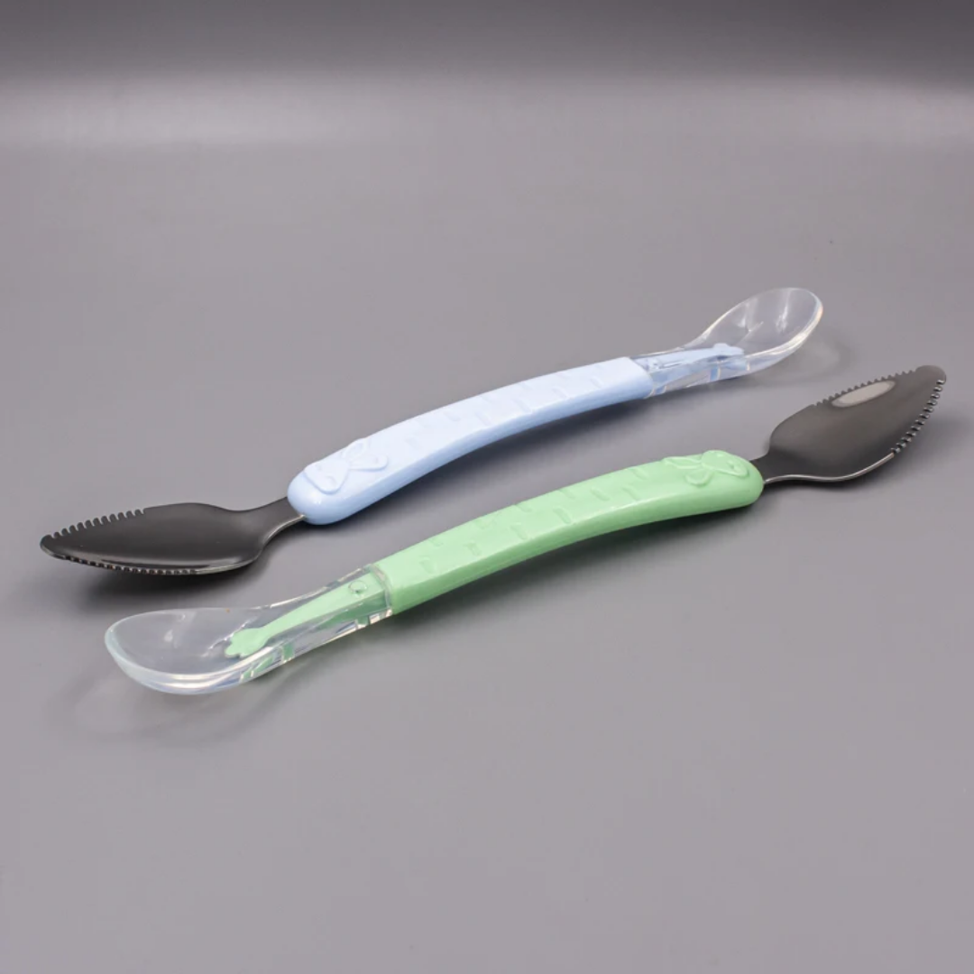 Dual head baby feeding spoon, stainless steel end for scrapping, soft silicon end for feeding, comes in blue, pink