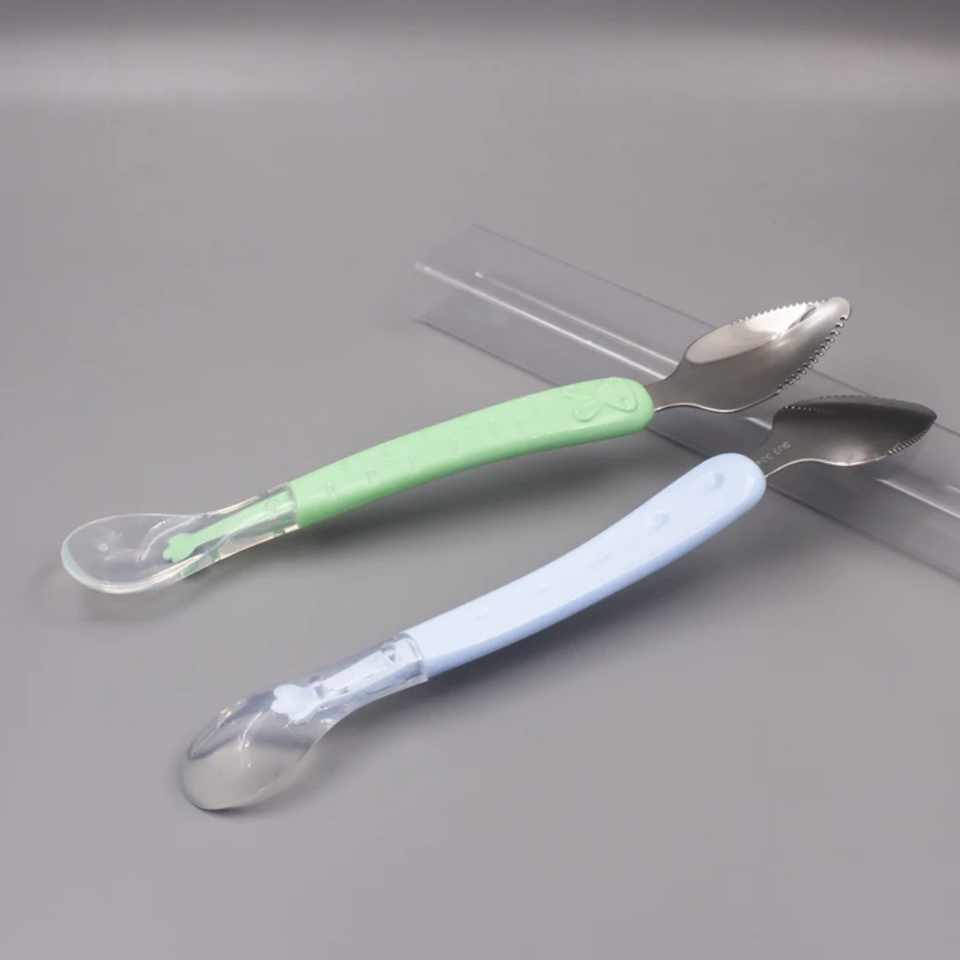 Dual head baby feeding spoon, stainless steel end for scrapping, soft silicon end for feeding, comes in blue, pink