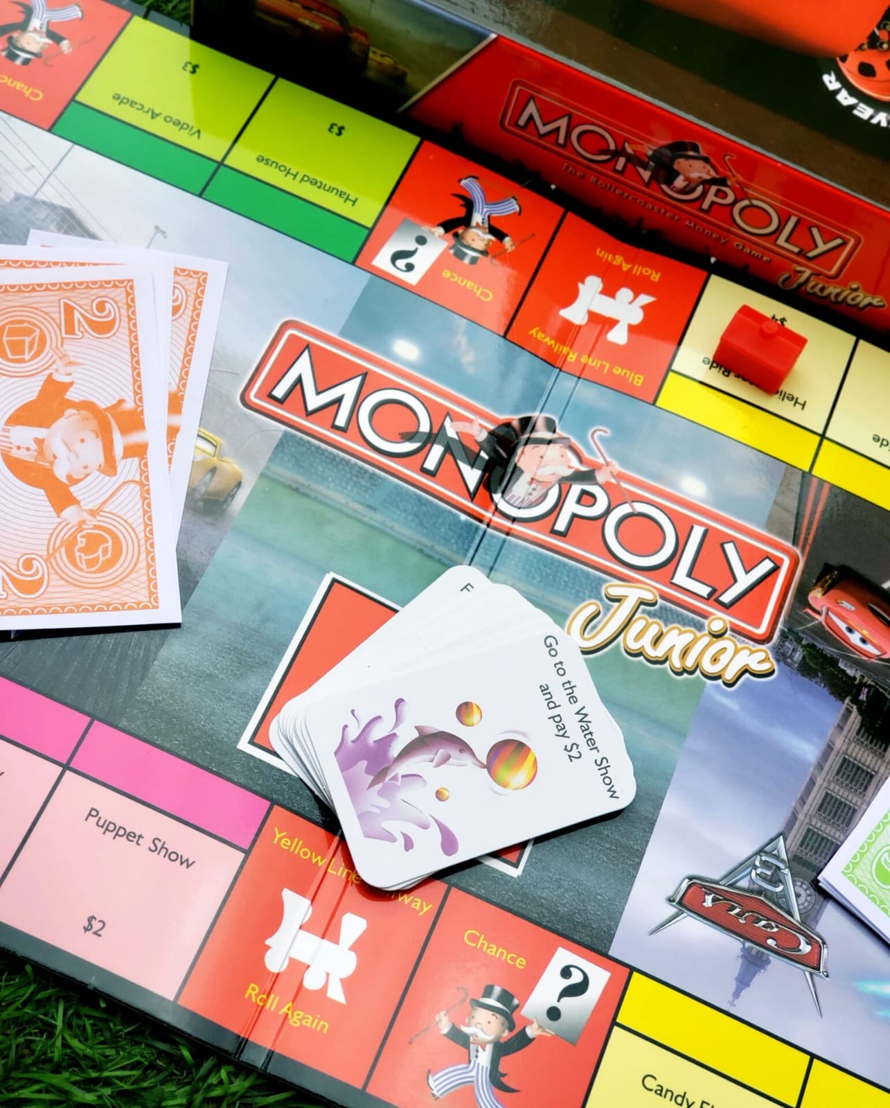 Monopoly Junior Cars Kids Property Trading Board Game Disney Pixar Cars Edition Simple Money Learning Game for Children Ages 5+