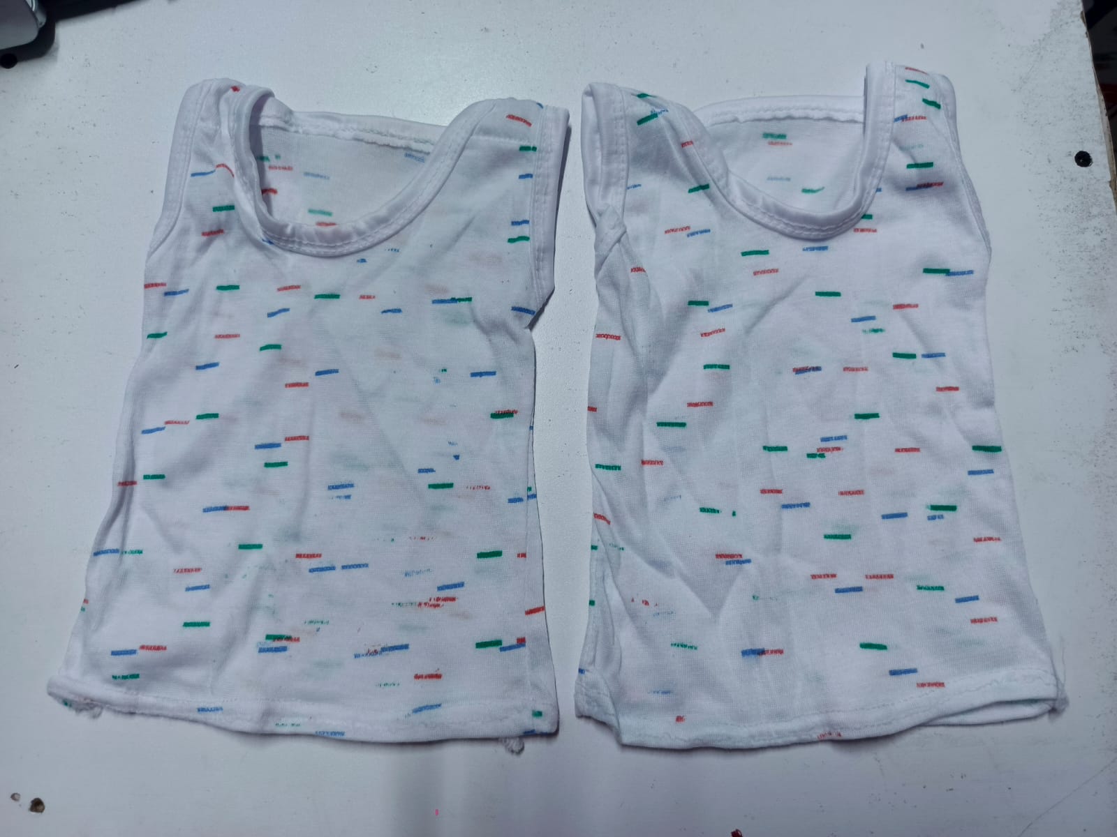 Lightweight Sleeveless Baby Vest for Newborns to 6 Months – Printed White Design