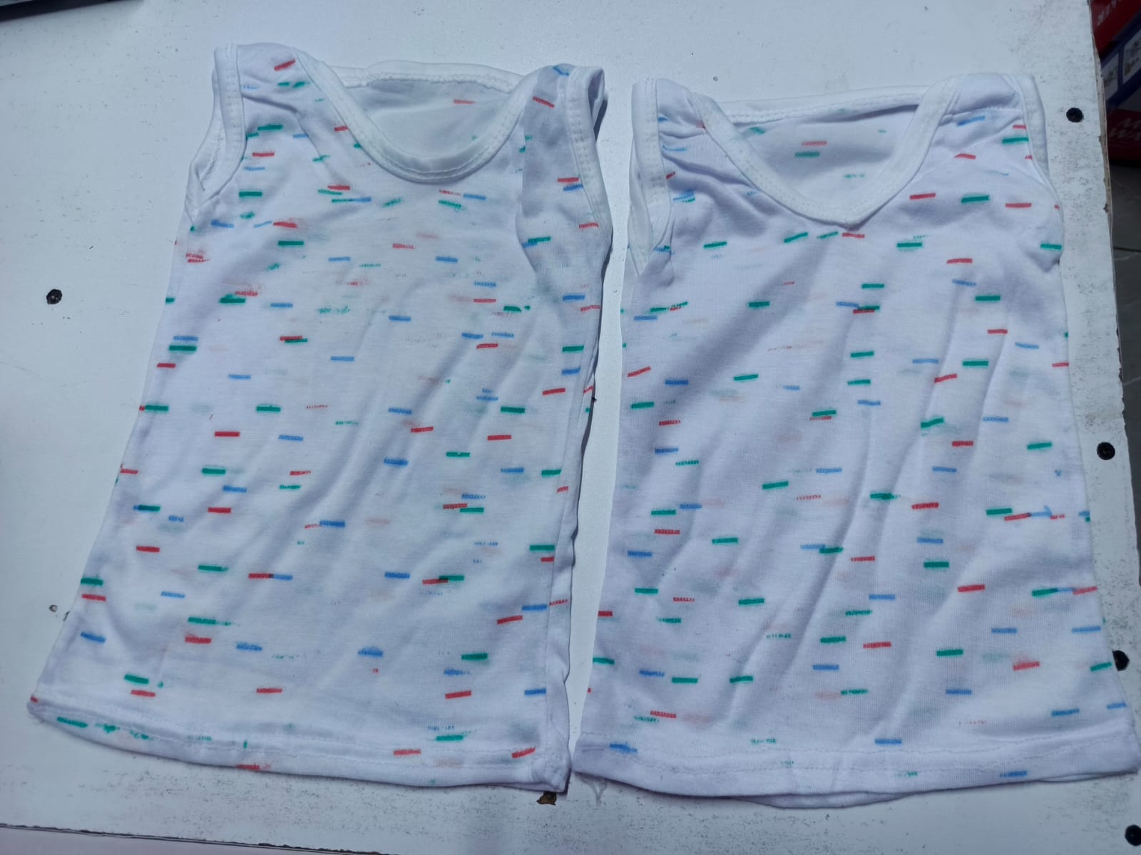 Lightweight Sleeveless Baby Vest for Newborns to 6 Months – Printed White Design