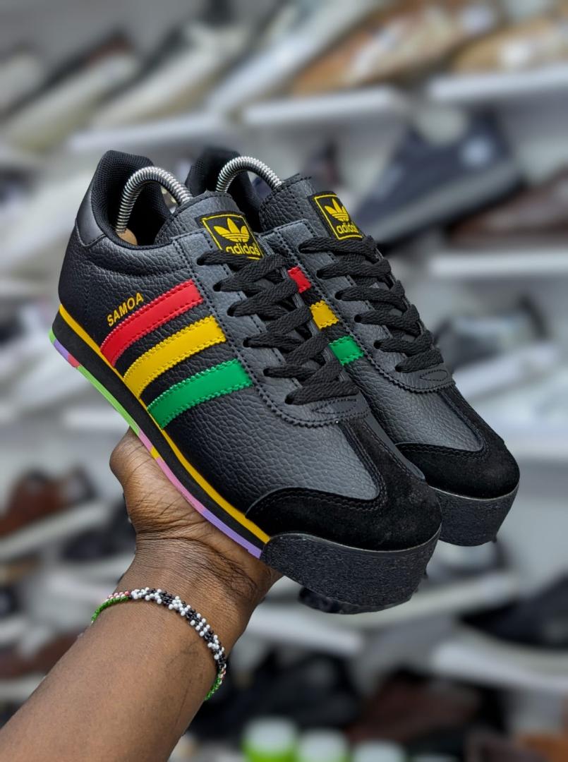 Adidas Samoa sneakers feature a smooth leather upper, signature rubber toe bumper, cushioned comfort, and classic sporty style for everyday wear.