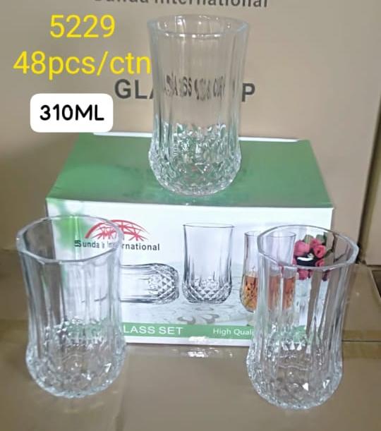 6PCS 310ML Long Diamond-Cut Drinking Glass Set. Designed with a luxurious crystal-like finish, these elegant tumblers add a touch of class to every sip — whether you're serving juice, water, cocktails