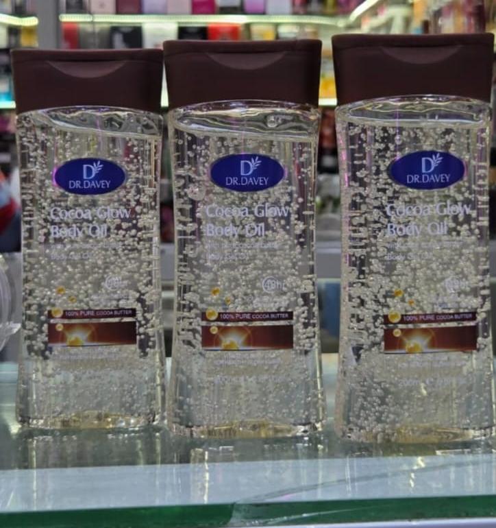 Dr. Davey Cocoa Glow Body Oils, formulated with 100% pure cocoa butter for skin hydration.Product Features: The oil is designed to moisturize, revitalize dry skin, and enhance natural glow.Formula: It