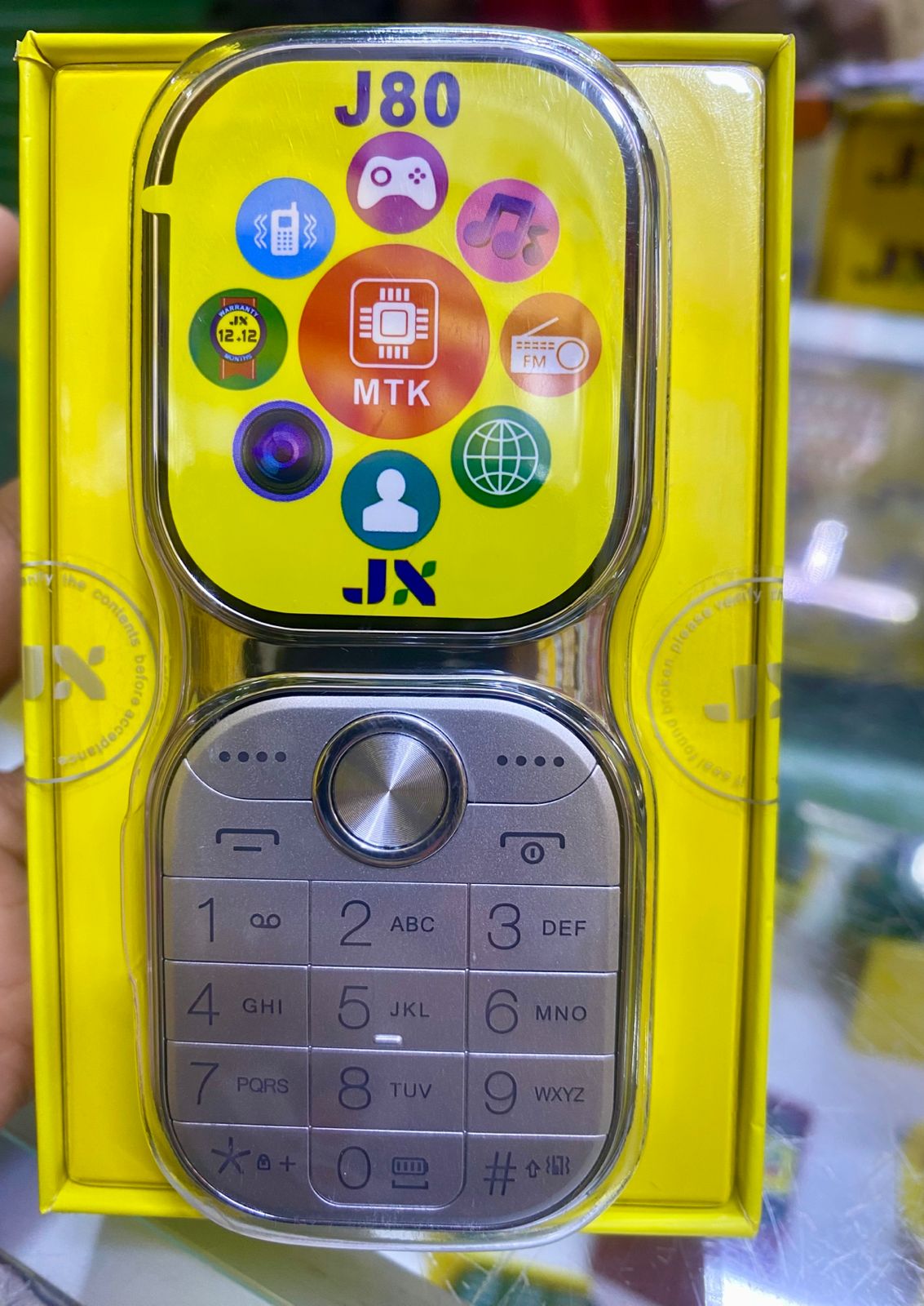 JX J80 NEW ARRIVAL KABAMBE/KATULULU/ MULIKA MWIZI MOBILE PHONE FEATURE PHONE WITH UNIQUE SHAPE SCREEN DISPLAY 2" BATTERY 1200MAH WIRELESS FM DUAL SIM CARD HD CAMERA ONE