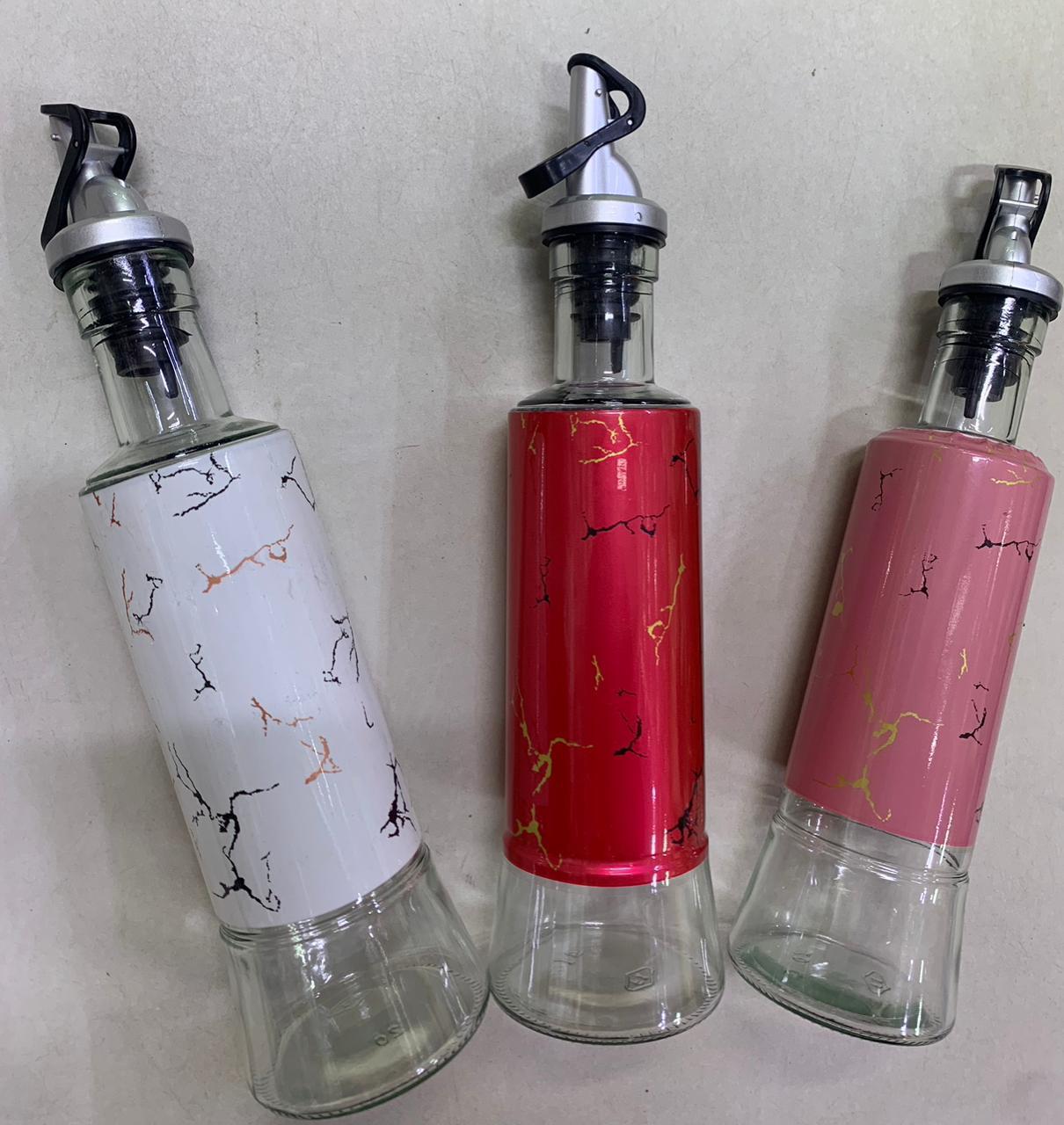 Oil Dispenser- Keep your kitchen organized and stylish with this Marble themed Oil Dispenser. Designed for convenient and controlled dispensing, it is ideal for storing and pouring cooking oil, olive