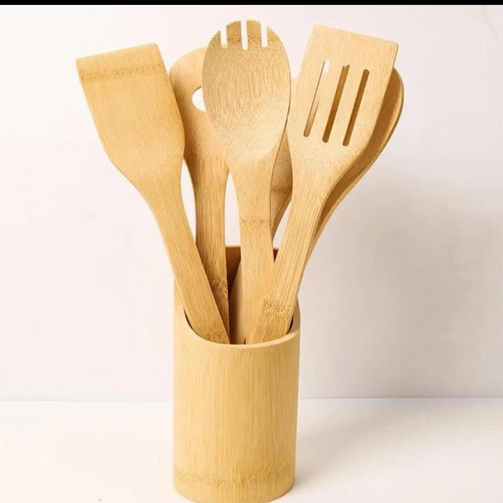 This bamboo kitchen utensil set is a practical and stylish addition to any modern kitchen. Made from natural bamboo wood, the set includes essential cooking tools.