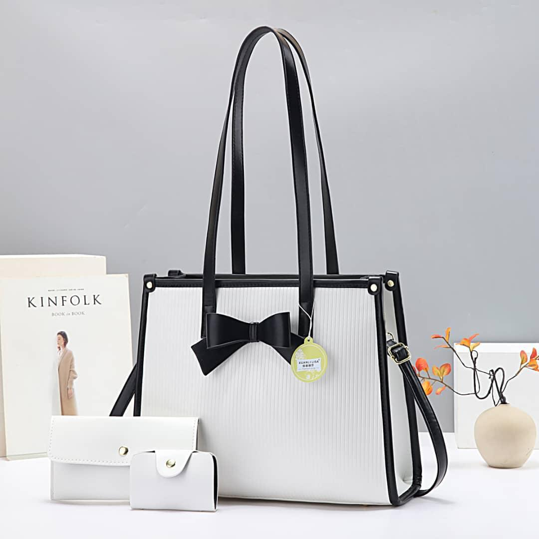 This elegant three-piece handbag set is designed for women who value both style and functionality. Featuring a sophisticated combination of white and beige tones.