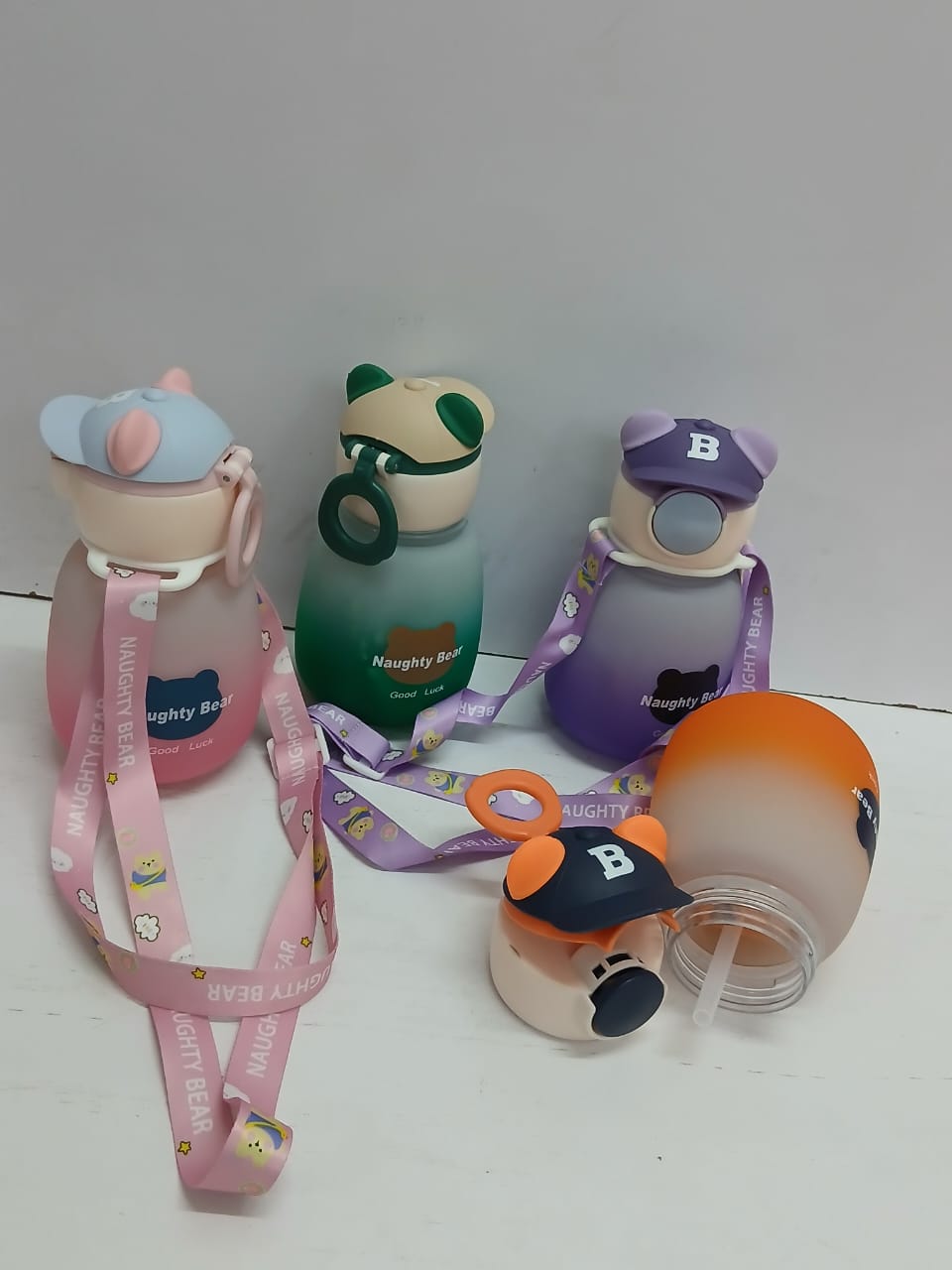 Kids Naughty Bear 500ml BPA-Free Plastic Water Bottle with Straw and Carry Strap – Pink, Orange, Green or Purple