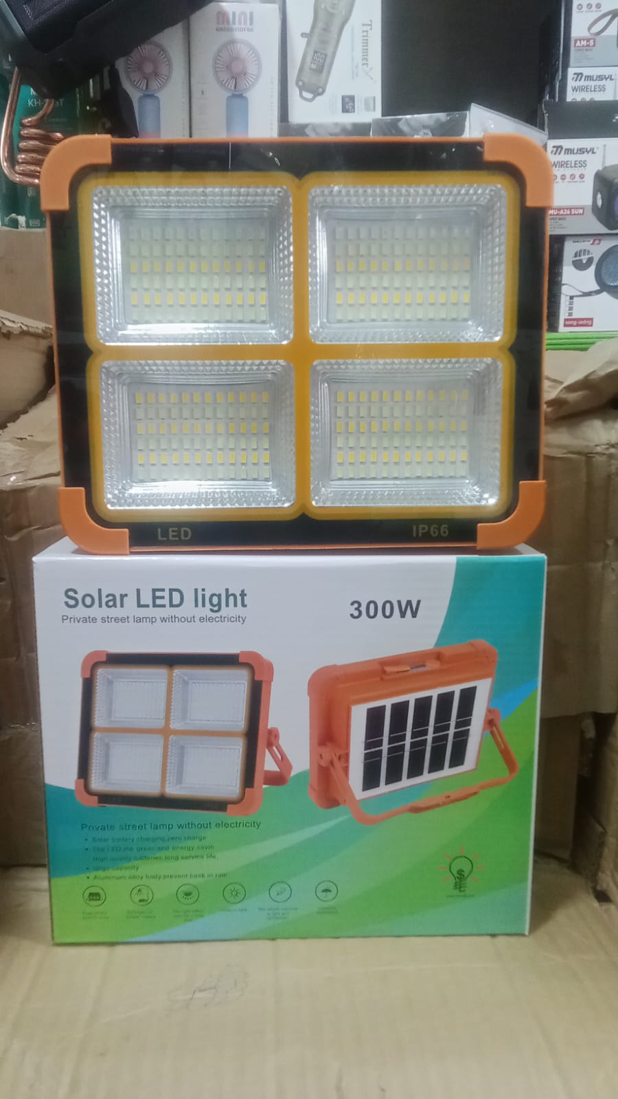 300W Solar LED Street Light with Integrated Solar Panel High-Brightness Outdoor Security Lamp Built-In Battery USB Emergency Charging Rainproof Housing and 4 Adjustable Brightness Modes for Street Gar