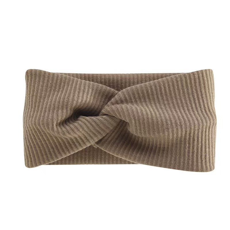 Bohemian-style wide, ribbed cotton, crisscross elastic headband for yoga and sports.