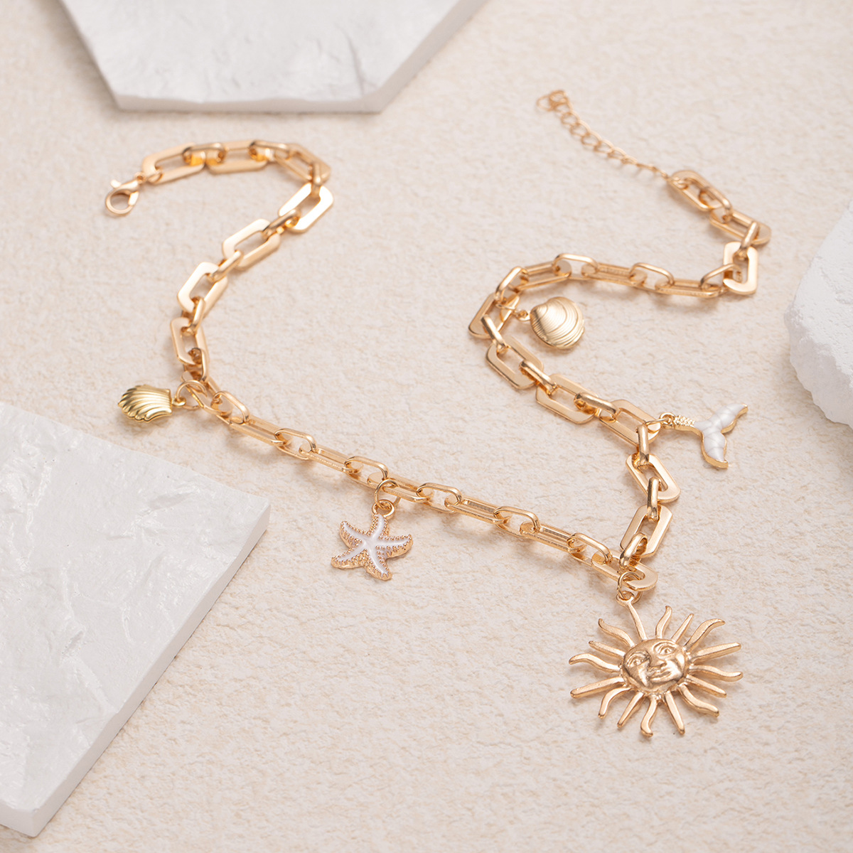 Holiday style necklace wholesale, cross-border retro jewelry from Europe and America, women's starfish, shell, fish tail, fashionable alloy sun pendant