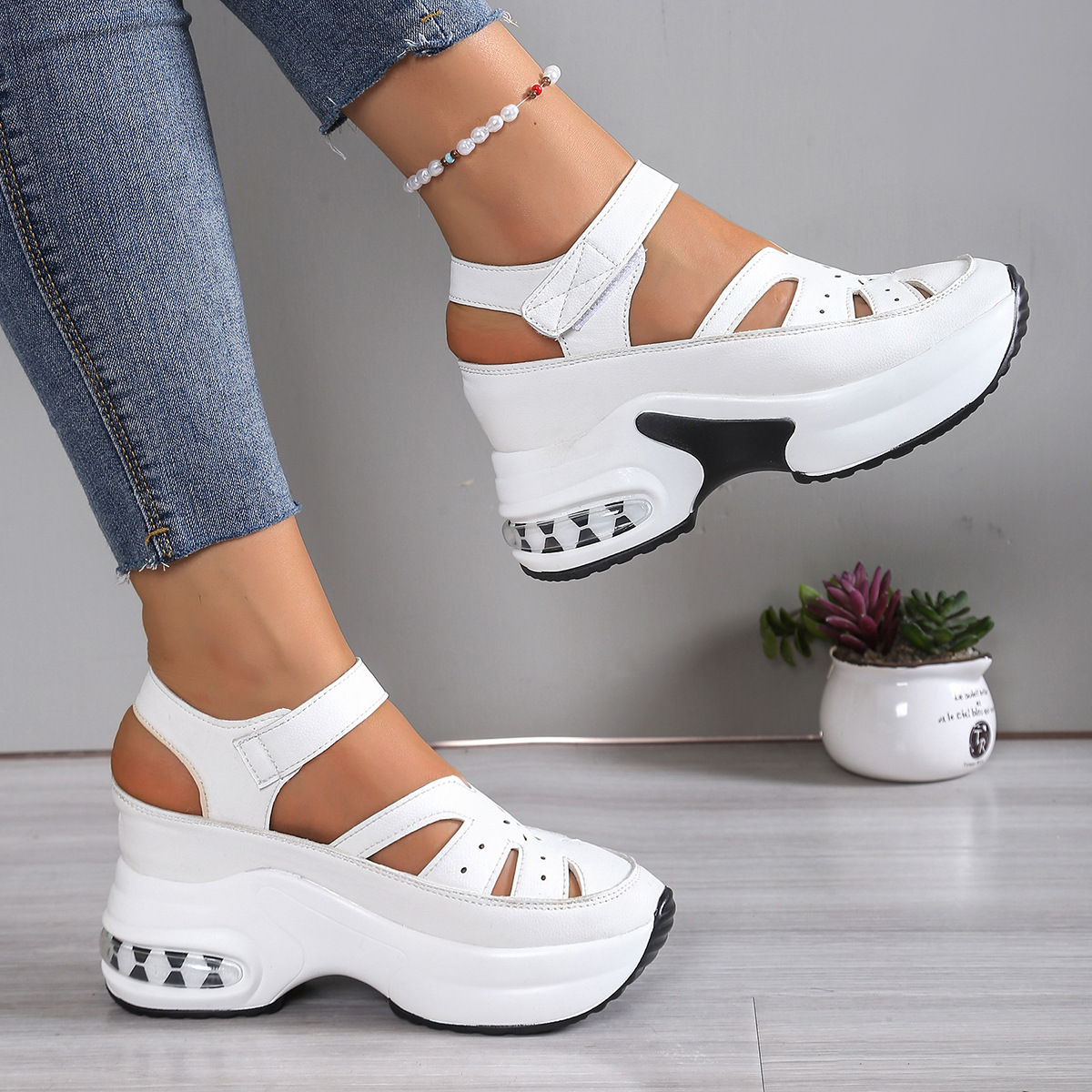 Summer new women's shoes with round heads and hollow wedges hook and loop thick-soled Baotou sponge cake sandals are suitable for daily leisure commuting parties.