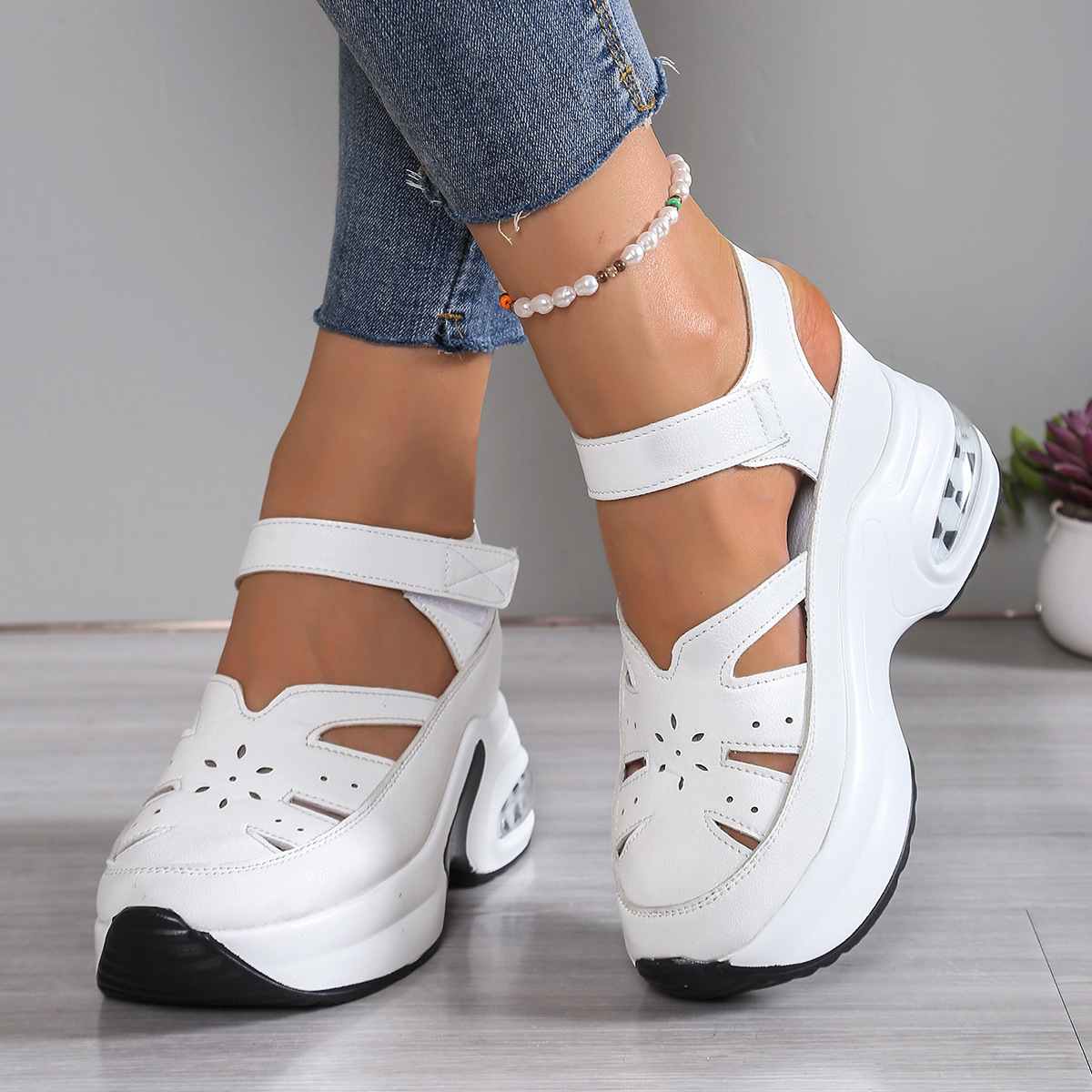Summer new women's shoes with round heads and hollow wedges hook and loop thick-soled Baotou sponge cake sandals are suitable for daily leisure commuting parties.