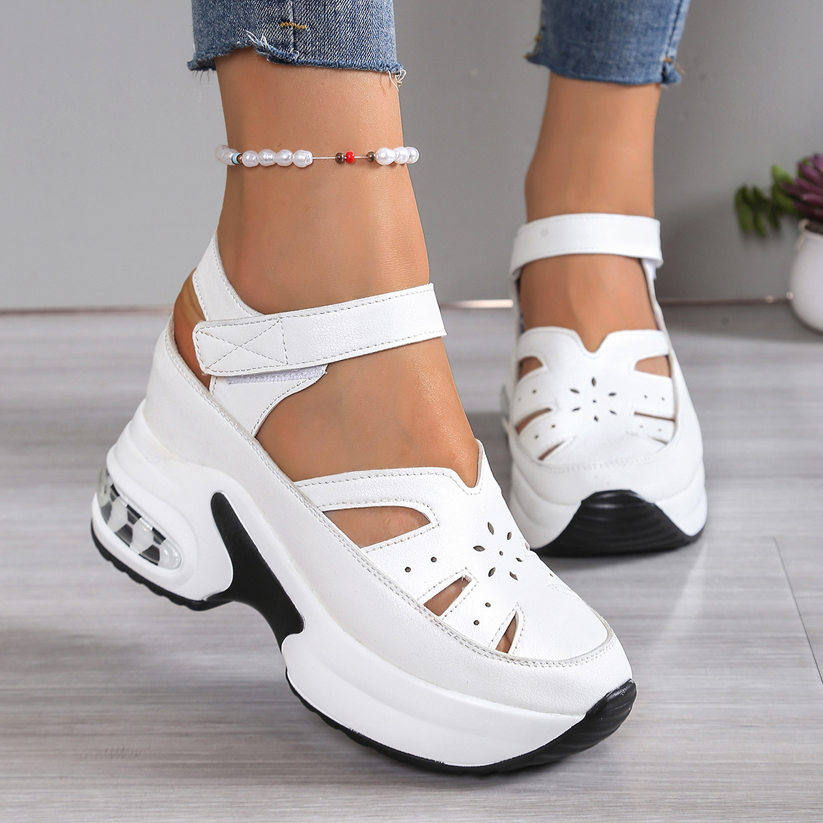 Summer new women's shoes with round heads and hollow wedges hook and loop thick-soled Baotou sponge cake sandals are suitable for daily leisure commuting parties.