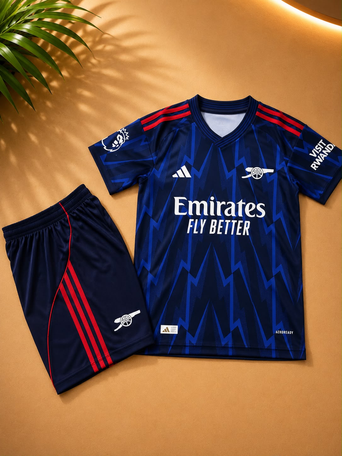New arrival 2025/26 2in1Premium Kids football set; Jersey + Shorts Set. Let your young Gunner show their passion for football with this stylish Kids Football Kit Crafted from lightweight fabric