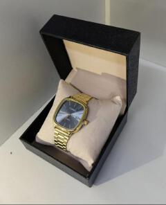Classic Gold Cushion Quartz Wrist Watch for Men - Stainless Steel Bracelet + Gift Box*

2. *Luxury Square Dial Men's Casio Watch Gold Tone - Business Dress Watch