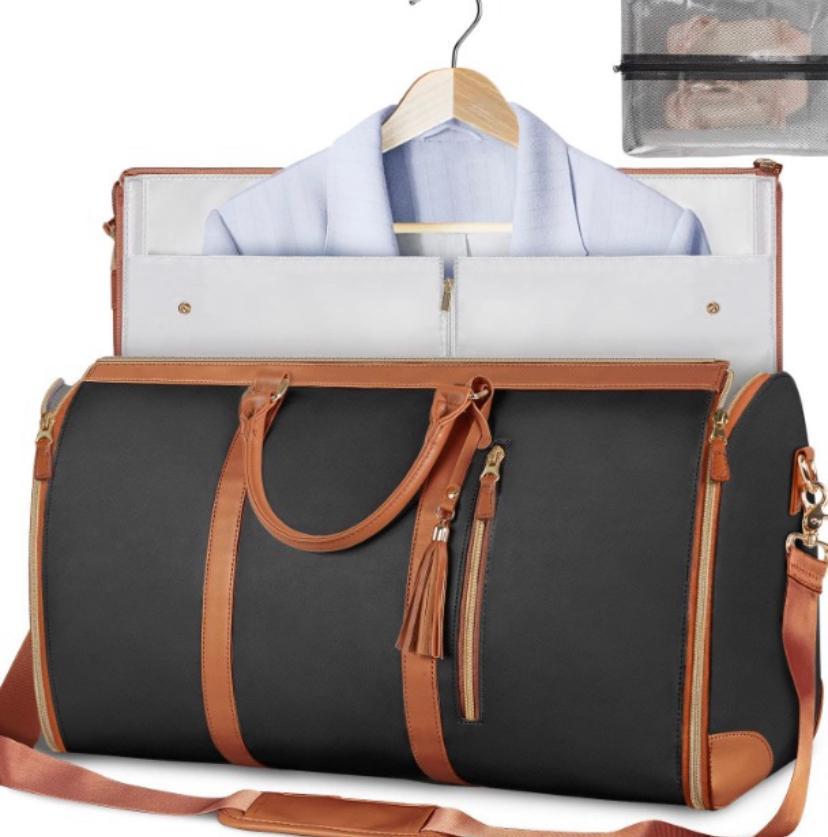 3 IN 1 Ytonet garment duffle bag. A black foldable clean classy leather PU travel bag ingeniously combines the features of a travel garment bag with expandable compartment for maximum use of its space
