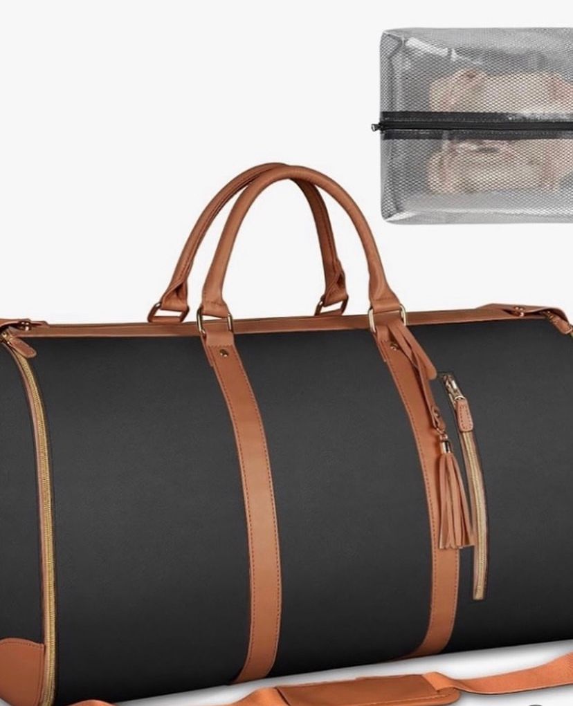 3 IN 1 Ytonet garment duffle bag. A black foldable clean classy leather PU travel bag ingeniously combines the features of a travel garment bag with expandable compartment for maximum use of its space