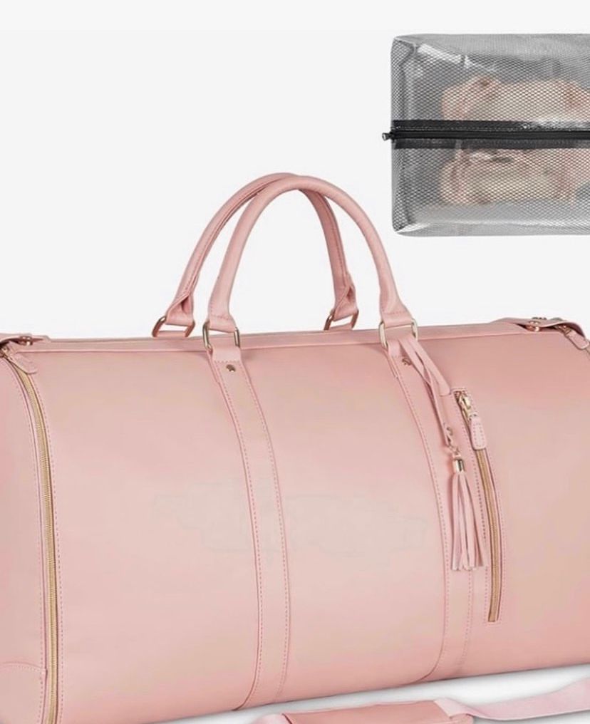 3 in 1 Ytonet garment duffle bag. A Pink foldable clean classy leather PU travel bag ingeniously combines the features of a travel garment bag with expandable compartment for maximum use of its space.