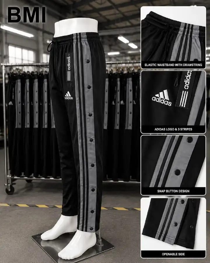🔥OFFER OFFER 🔥Premium Tracksuit...# Tear-Away Track Pants with bold Rasta 3-Stripes.Perfect for Gym, Football Training, Basketball Warm-ups, or Casual Street Style