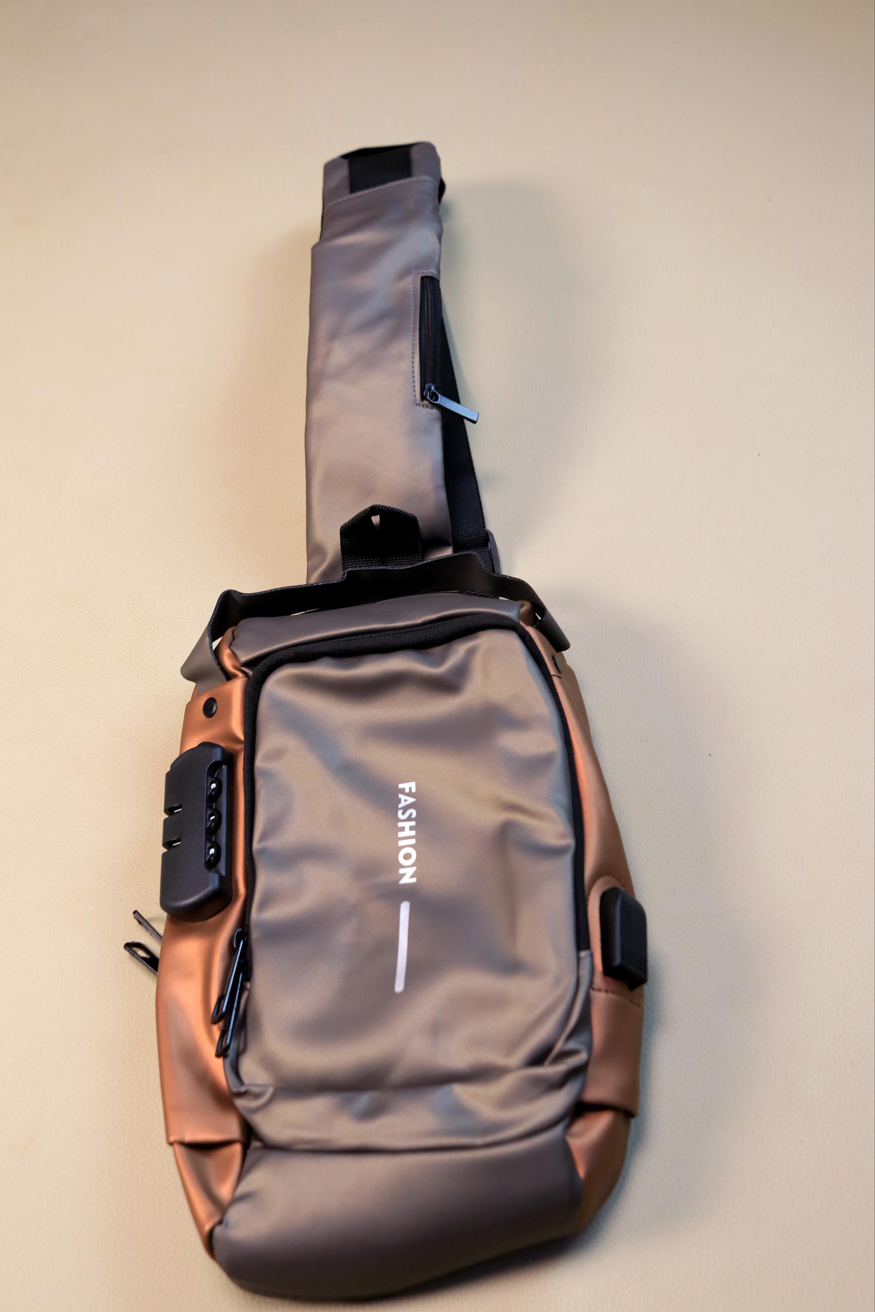 Men's Anti-Theft Crossbody Sling Bag – Water-Resistant Chest Shoulder Backpack with USB Charging Port & Combination Lock
