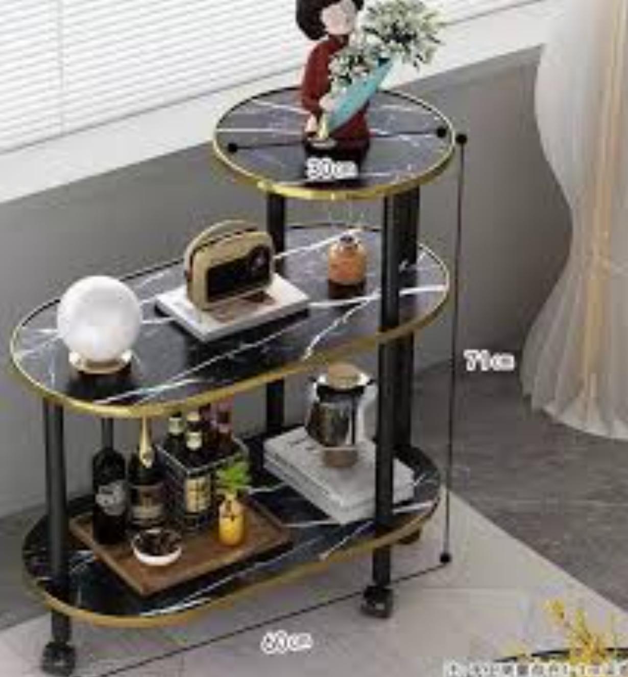 NEW ARRIVAL ! 60x30x67cm 3 layer 2 oval round top trolley rack table  is a premium, stepped accent piece that brings a luxurious, editorial look to modern home interiors.