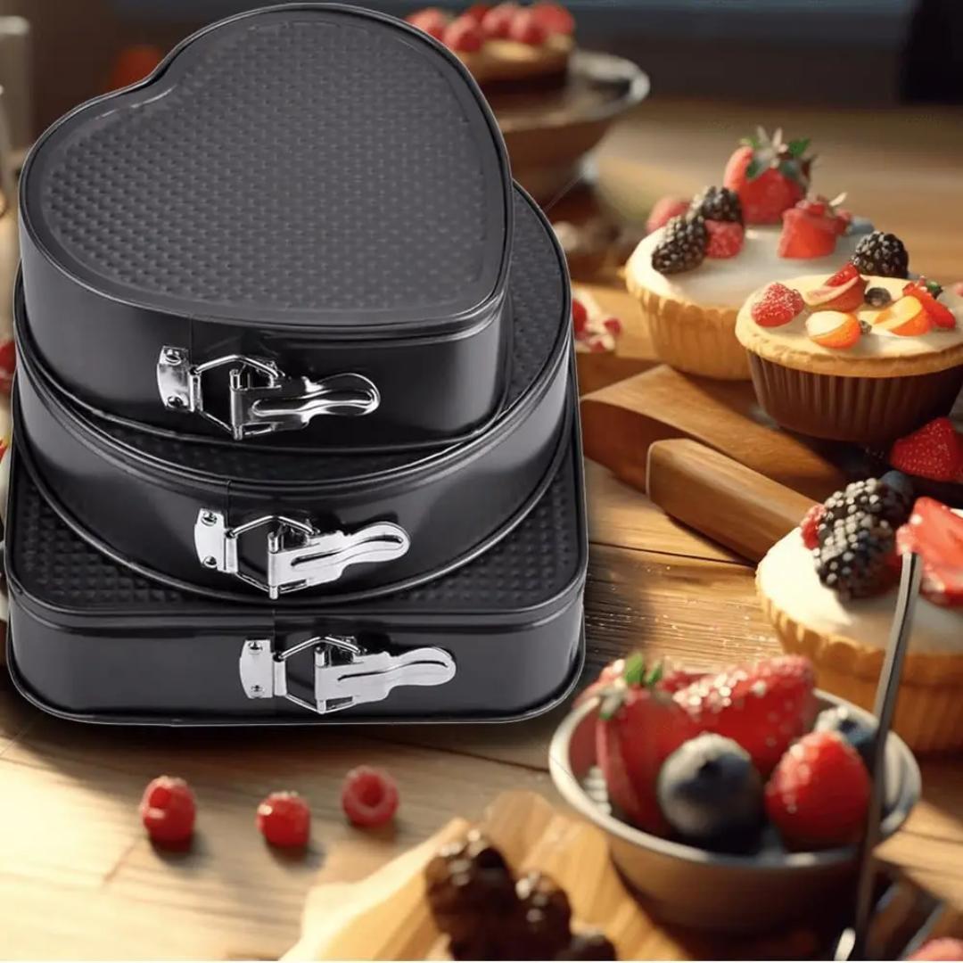 3-Piece Set of Cake Moulds. The moulds are designed for easy cake preparation and for a variety of cake recipes.