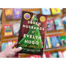 The Seven Husbands of Evelyn Hugo Novel by Taylor Jenkins Reid -  A reclusive aging Hollywood movie icon recounts her glamorous life, relentless ambition, and seven tumultuous marriages to an unknown