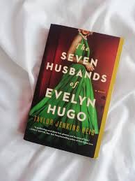 The Seven Husbands of Evelyn Hugo Novel by Taylor Jenkins Reid -  A reclusive aging Hollywood movie icon recounts her glamorous life, relentless ambition, and seven tumultuous marriages to an unknown
