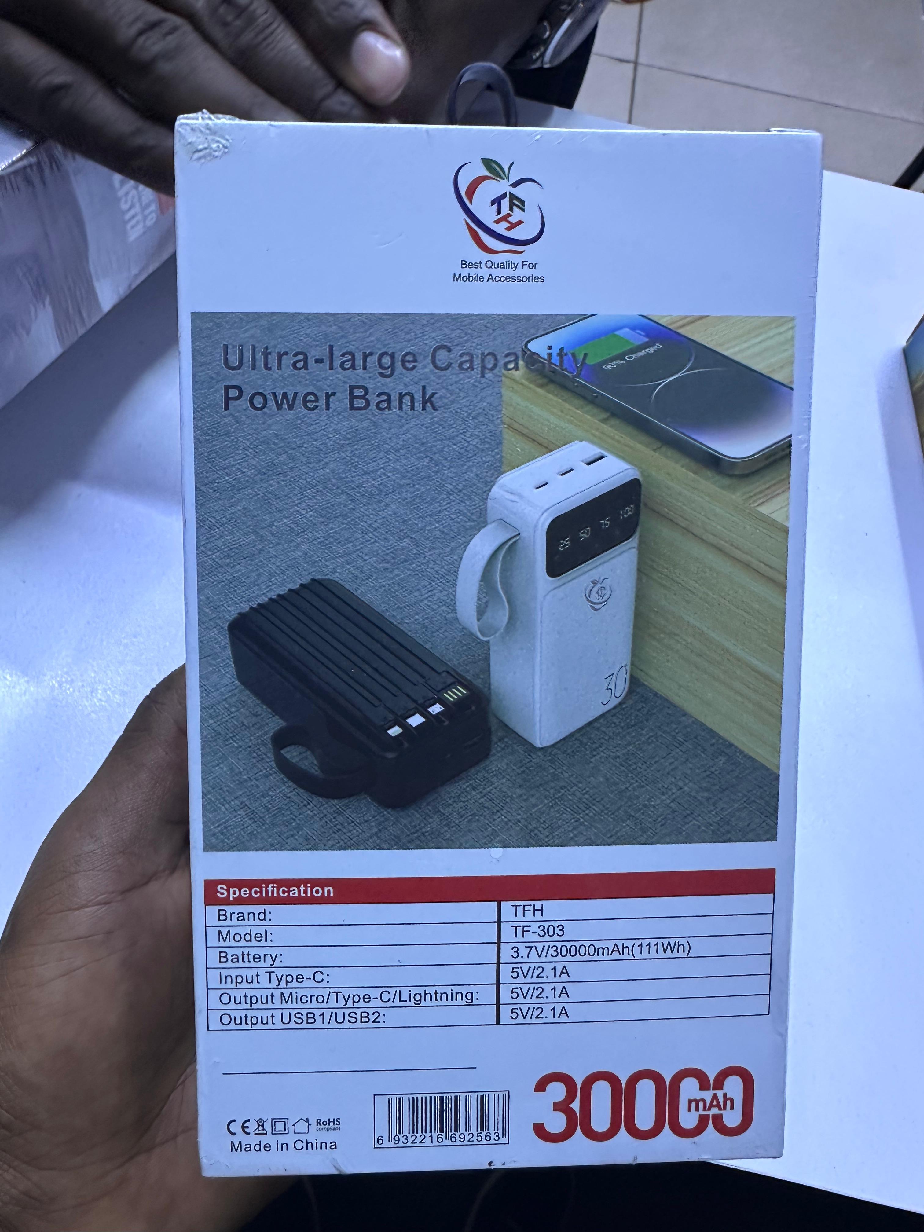TFH TF-303 30000mAh Power Bank – High Capacity Fast Charging Portable Charger with Built-in 4 Cables, LED Display, Dual USB Output & Type-C Input (White/Black)