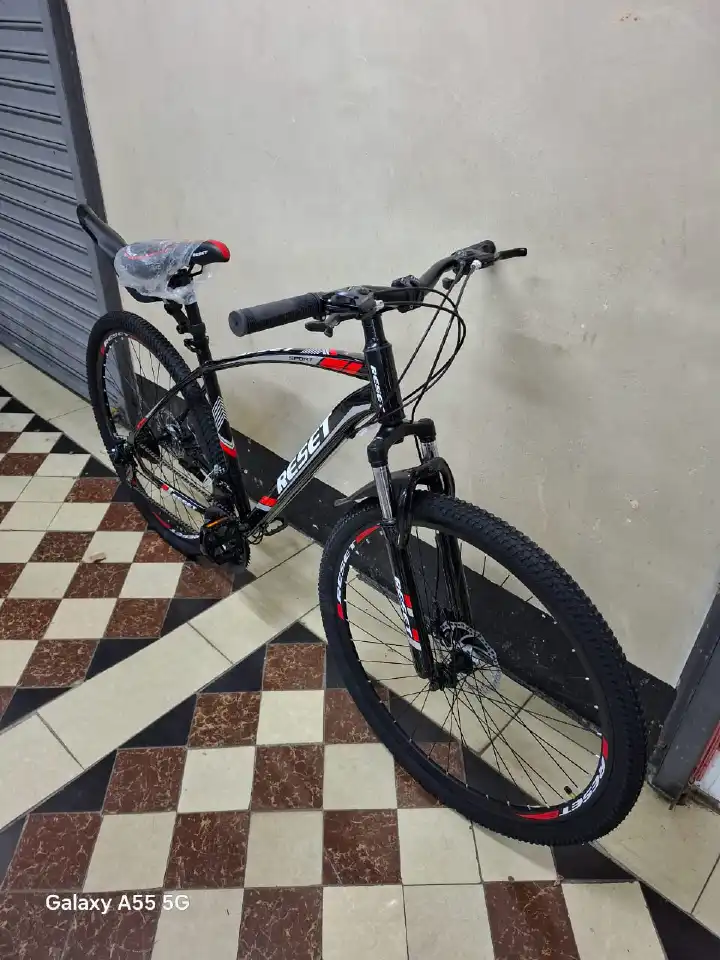 21 Speed Mountain Bike 3×7 Gears Front Rear Disc Brakes Suspension Fork MTB Tyres Strong Frame Adjustable Saddle Mudguards Platform Pedals Adult Tall Riders