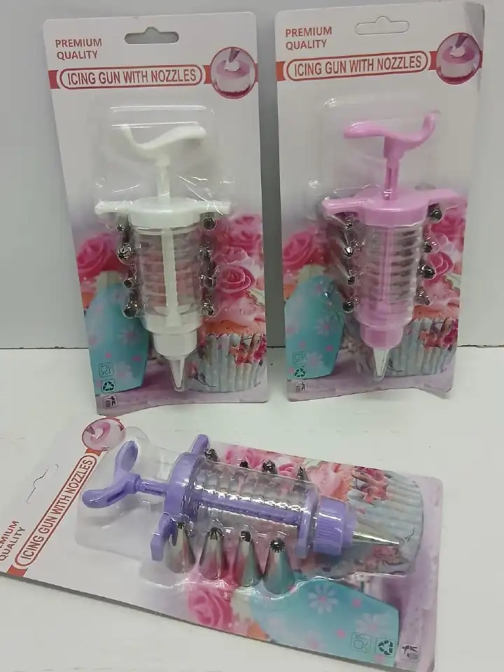 Cake icing noozles plus gun,Material: Stainless steel noozles with plastic gun, Colours: White, Pink and Purple