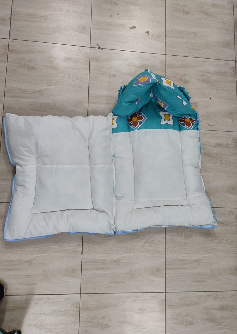 3-in-1 multifunctional baby sleeping bag, carry nest, and portable bedding mattress.Typically constructed from a breathable cotton blend with a plush microfiber or polyester cushioned filliing