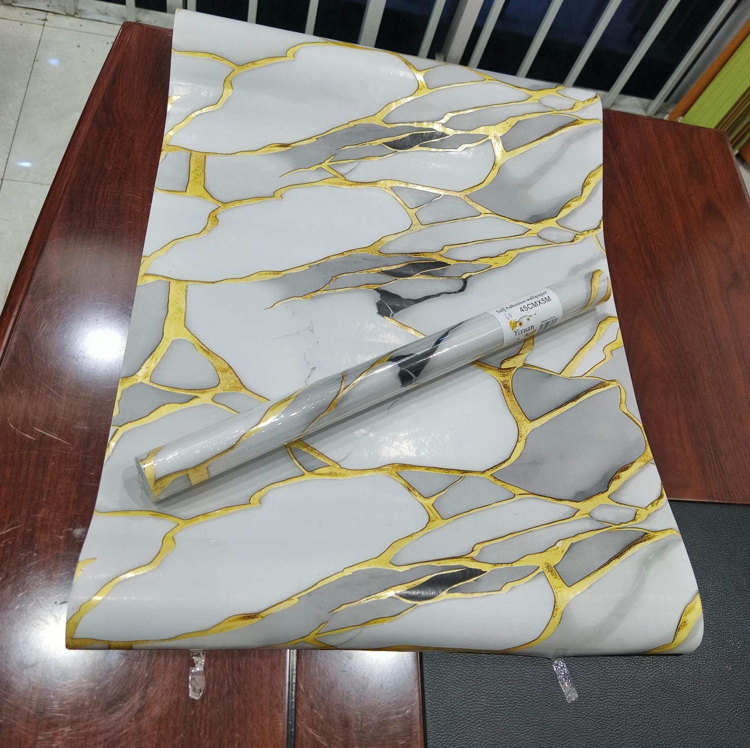 Marble contact papers that are self adhesive, vinyl contact paper in size 60cm by 2M, perfect for furniture, kitchen counters, bathroom counters, tables, anything you want to cover