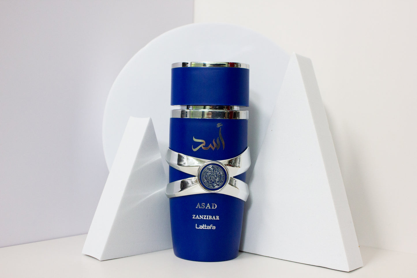 Lattafa Asad Zanzibar Eau De Parfum 100ML  it opens with an intoxicating blend of black pepper, pineapple, and tobacco, leading into a heart of coffee, patchouli, and iris