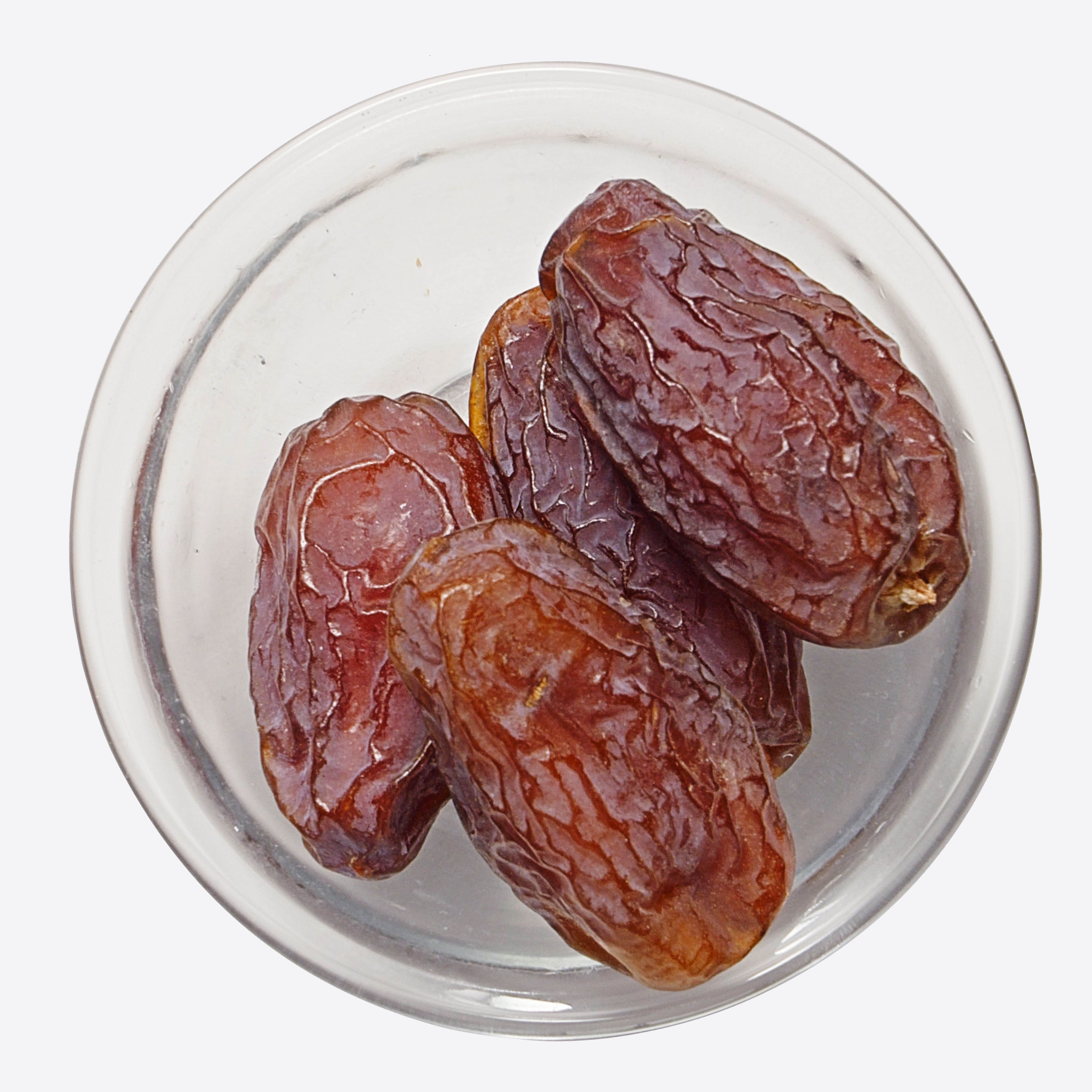 Dates are the sweet, oval-shaped fruits of the date palm tree  is primarily grown in tropical and arid regions like the Middle East and North Africa. Often referred to as "nature’s candy."