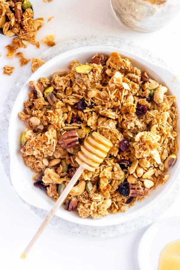 Baked honey granola is a crunchy,naturally sweetened breakfast classic made by coating rolled oats,nuts,and spices in a warmed honey-and-oil mixture before baking.the honey acts as a natural sweetener