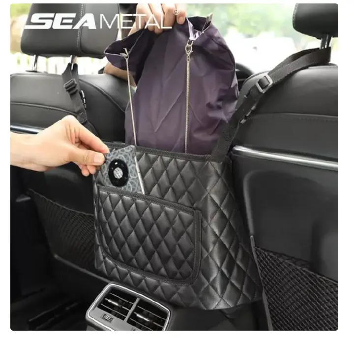 High quality PU leather car in between seat organizer  Operates as an open storage pocket/handbag holder and acts as a pet/kid barrier to prevent rear passengers from disturbing the driver.