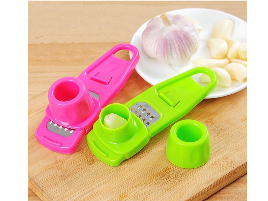 2-in-1 manual ginger and garlic press crusher grinder used for garlic, ginger, and vegetables . It is a compact, handheld kitchen gadget designed to quickly mince, grate, or slice small ingredients