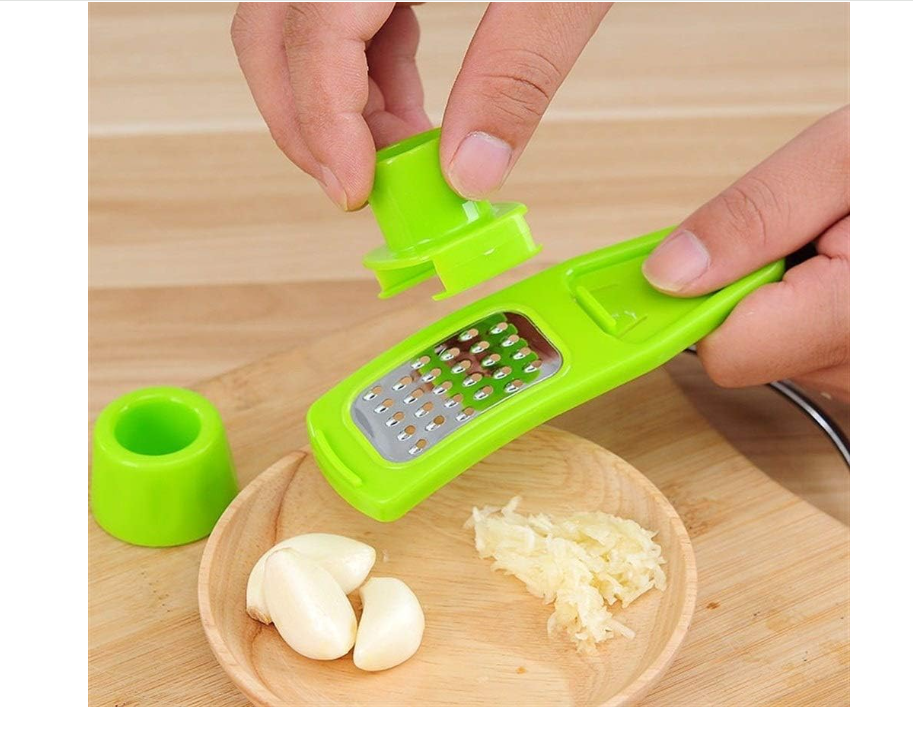 2-in-1 manual ginger and garlic press crusher grinder used for garlic, ginger, and vegetables . It is a compact, handheld kitchen gadget designed to quickly mince, grate, or slice small ingredients