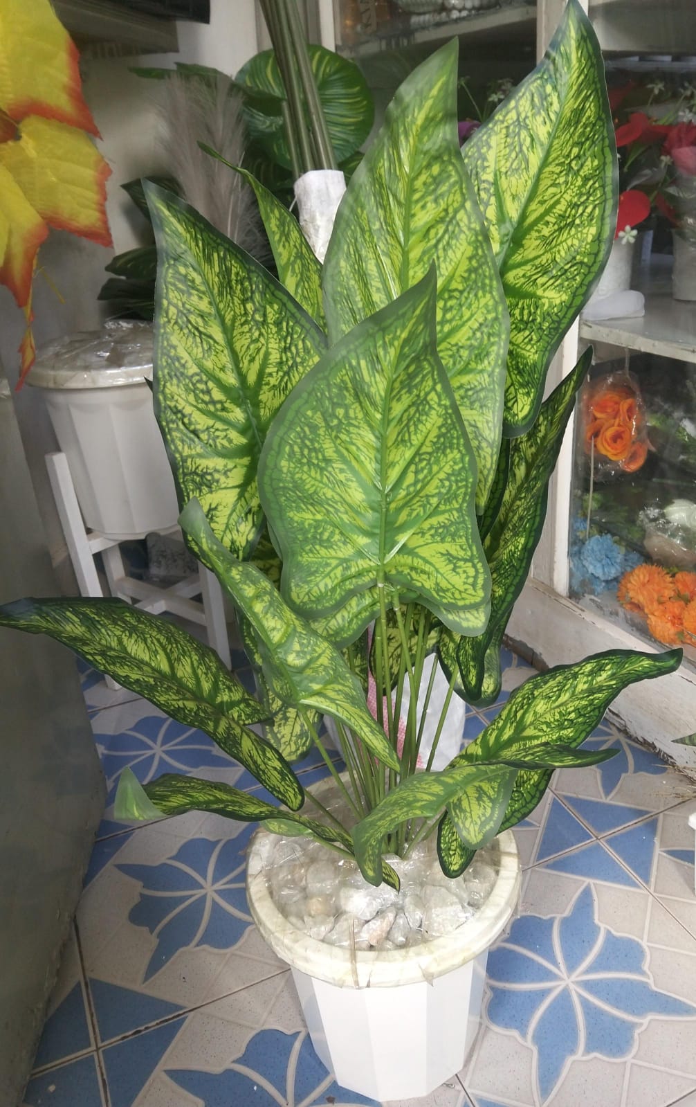 Artificial Flower Arrangement Set    Made from environmentally friendly materials, this decorative piece not only enhances your interior but also contributes to a sustainable lifestyle